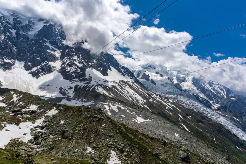 The great peaks of the Mont Blanc massif in June. Alps.